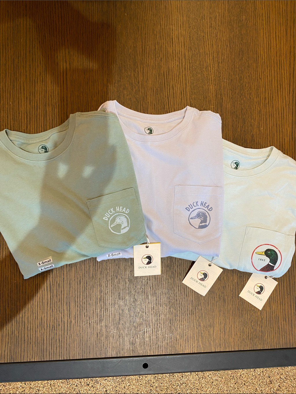 Duck Head Men’s Pocket Tees In Pastel Green, Light Blue, And Pastel Blue Heather